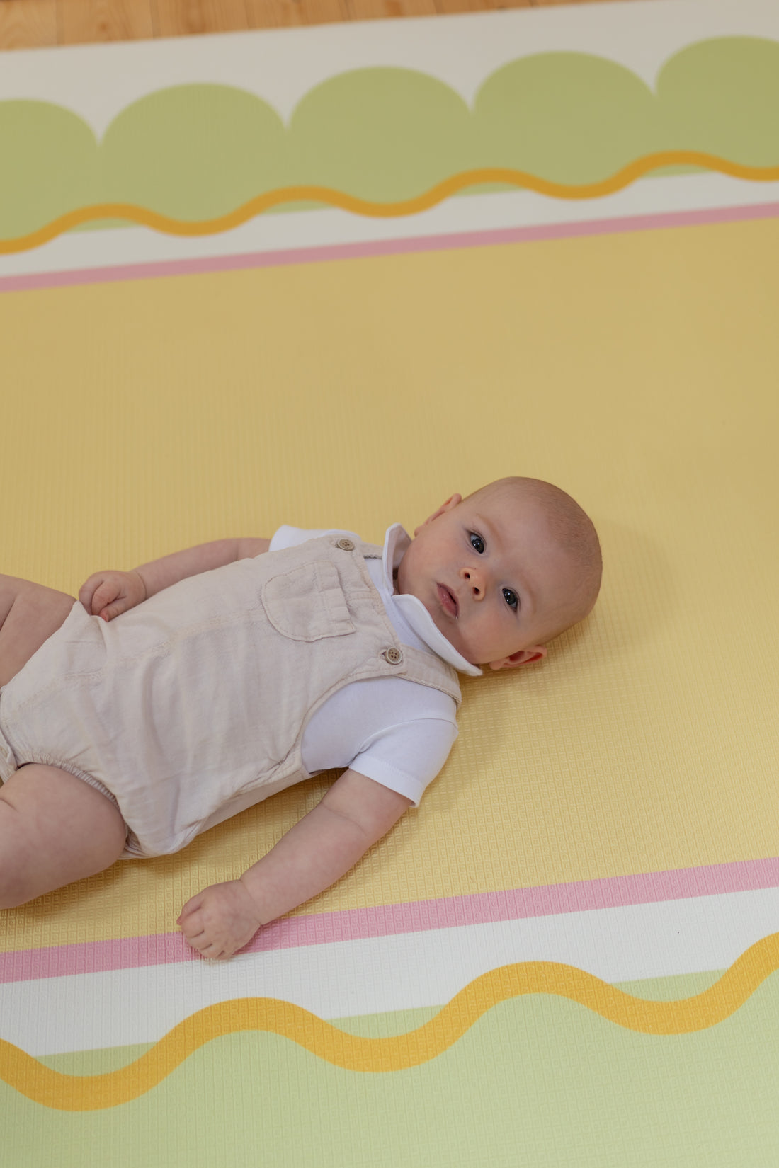 Soft &comfortable baby on a playmat